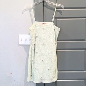 Elegant Mini Dress covered in stones.